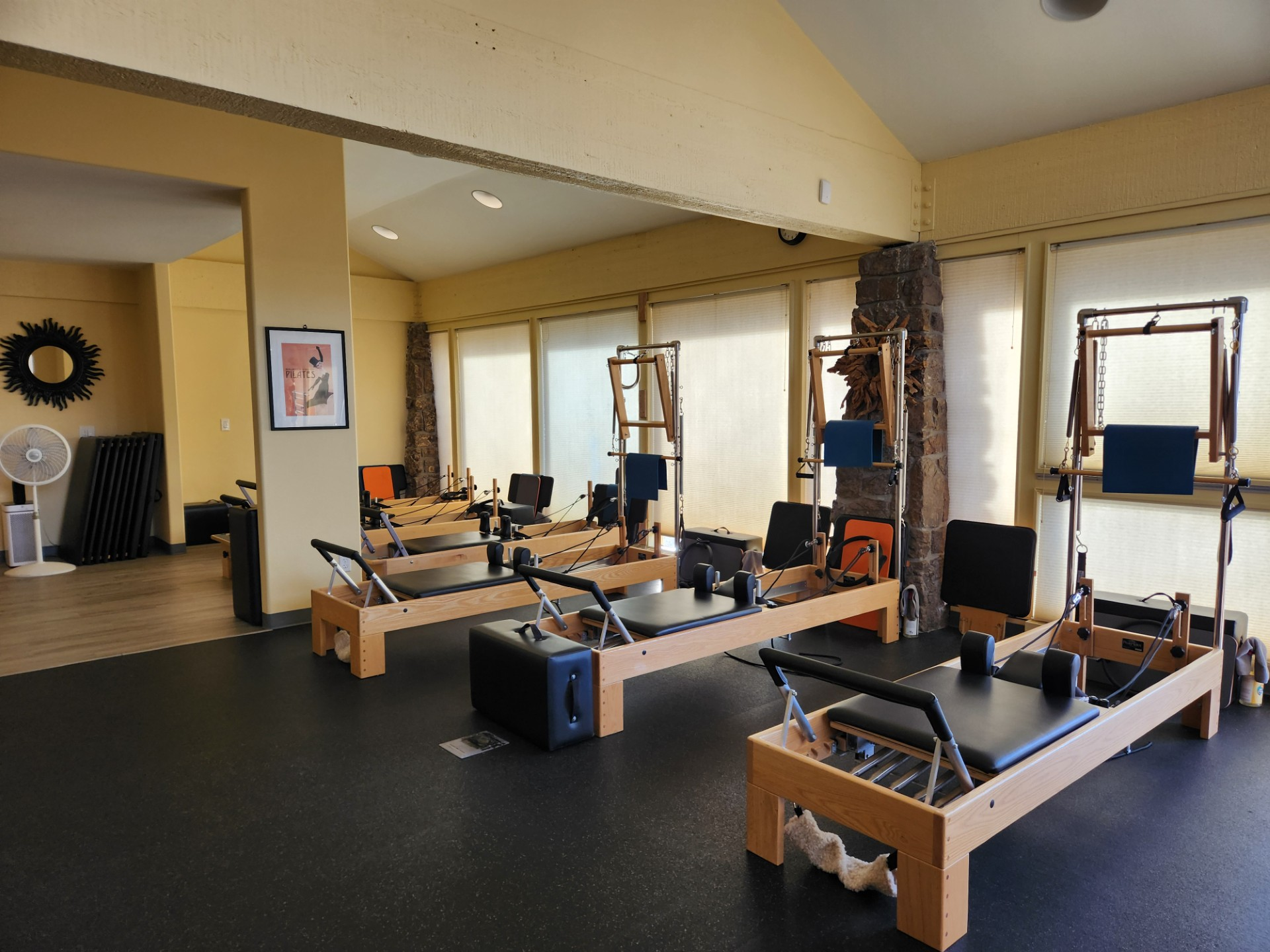 Sun Pilates studio in Colorado Springs — reformers and tower equipment in the classical Pilates room